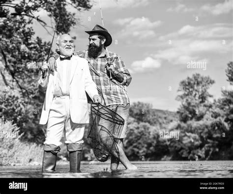 Gone Fishing Fly Fishing Adventures Retired Father And Mature Son With Beard Friends Men With