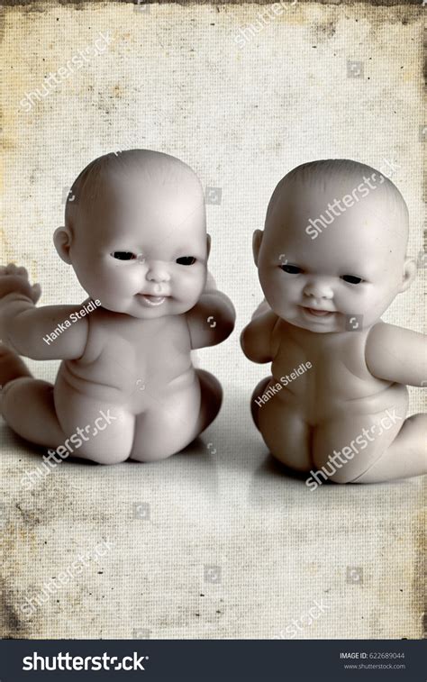 Two Nude Baby Dolls Distorted Heads Stock Photo Shutterstock