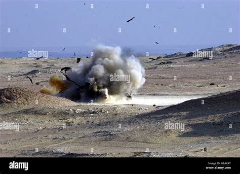 Medium shot of an explosion created by a missile fired from a German Milan anti-tank weapon ...