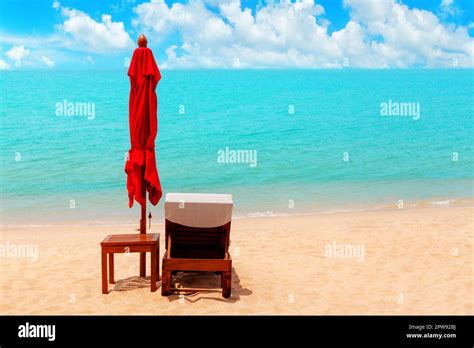 Red Closed Umbrella Empty Deck Chair Table Folding Solar Parasol