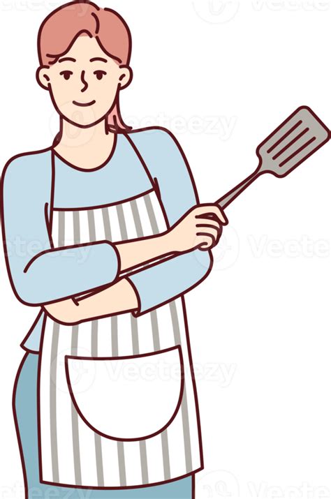 Smiling Woman Housewife In Apron Stands With Arms Crossed With Spatula