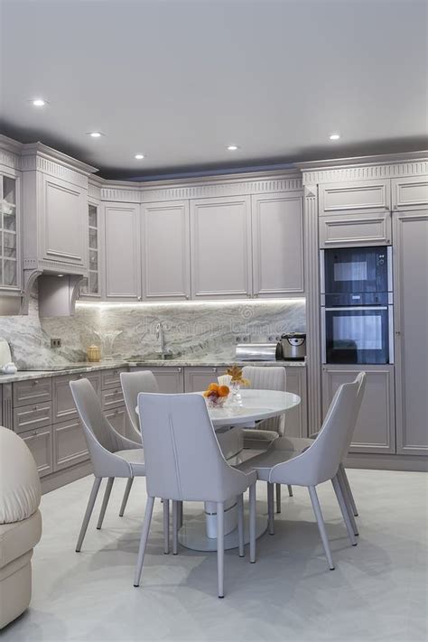 Modern Beige and Grey Colored Kitchen Interior in Classic Style with ...