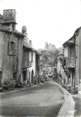 CPSM FRANCE 12 Najac La rue du Barriou et château du XIIIème siècle