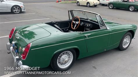 1966 MG MIDGET CONVERTIBLE BRITISH RACING GREEN WITH BLACK TRIM AND