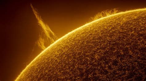 Stunning solar tornado swings into space above the glowing sun (video ...