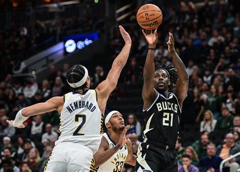 Holiday Picks Up Slack As Giannis Less Bucks Rout Pacers