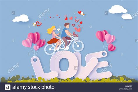 Valentines Day Card With Couple Riding Tandem Bicycle On Big Letters Love With Air Balloons On