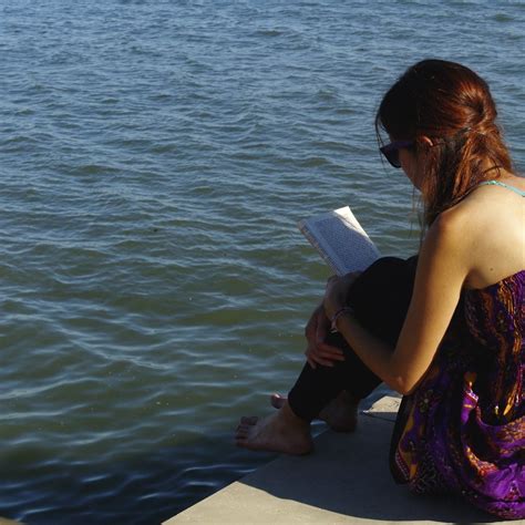 Candid Girl Reading Ribeira Das Naus Lisbon Portugal Pedro