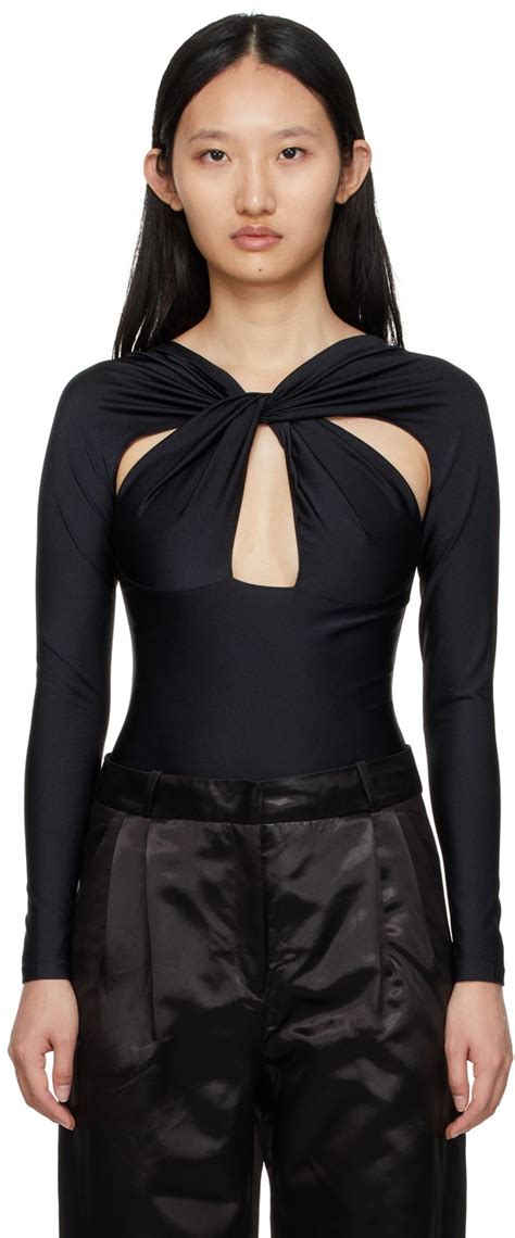 Rita Ora Wears Black Mini Dress With String Bikini Detail Daily Mail Online