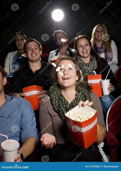 Eating Popcorn At The Cinema Stock Photos - Image: 21374523