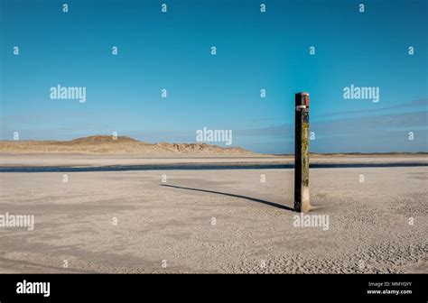 Beach pole typical for the beaches of Texel in The Netherlands Stock Photo - Alamy