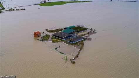 Britain Rallies Behind Flooded Villages As Tesco Sends Hundreds Of Food