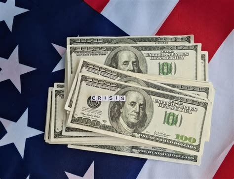 Premium Photo Stack Of Money On American Flag And Text Financial