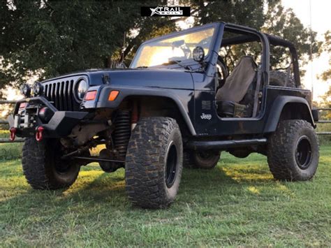 2002 Jeep TJ Wheel Offset Aggressive 1 Outside Fender Suspension