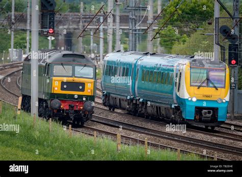 Class 175 Arriva Dmu Train At Winwick With D1944 Diesel Locomotive