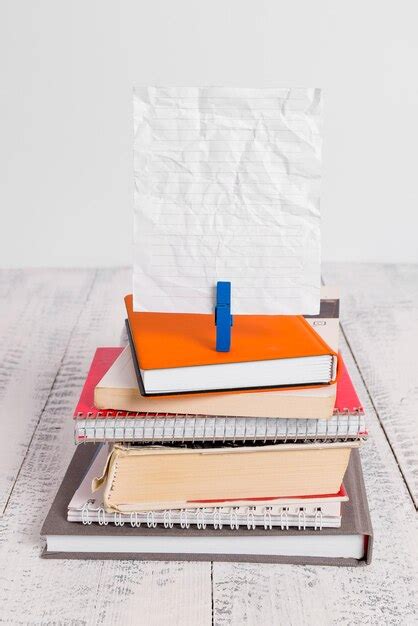 Premium Photo Stack Of Books On Table