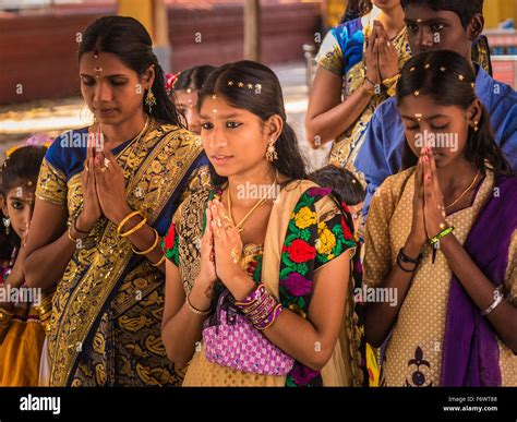 Members Of A Wedding Party Praying In A Hindu Temple Bekal Kerala