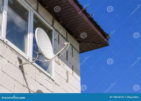 Satellite Dish Hanging On The Wall Of The House Stock Image Image Of