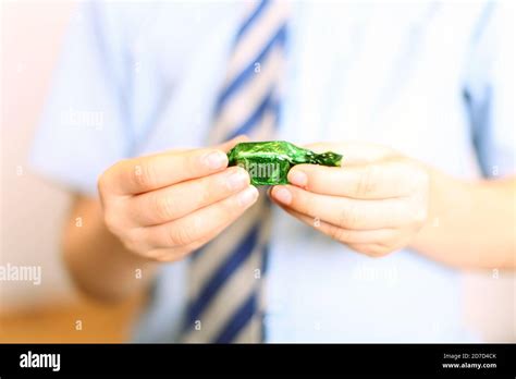 Boy Unwrapping Milk Choc Block Hi Res Stock Photography And Images Alamy