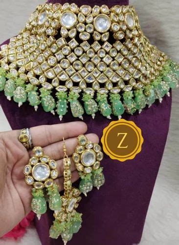 Zevar Multicolored Kundan Gold Toned Brass Necklace Set At Rs