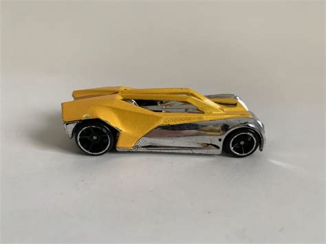 MINIATURA HOT WHEELS 1 64 LOOSE SPLIT VISION 2007 AMARELO E PRATA SEM BLISTER NO ESTADO