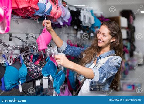 woman buying brassiere stock photo image  relaxation