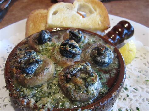 Here And There Escargot Baked In Mushroom Caps