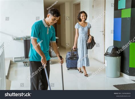 Janitor Wearing Turquoise Uniform Sweeps Female Stock Photo 2185828929 ...