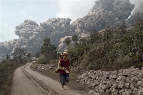 Major Volcanic Eruption Kills at Least 14 in Indonesia - The New York Times