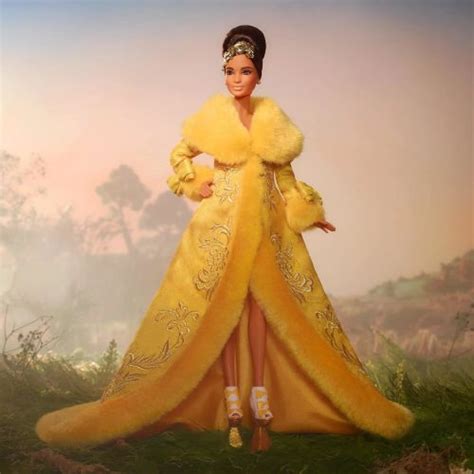 Guo Pei Barbie Doll Wearing Golden Yellow Gown