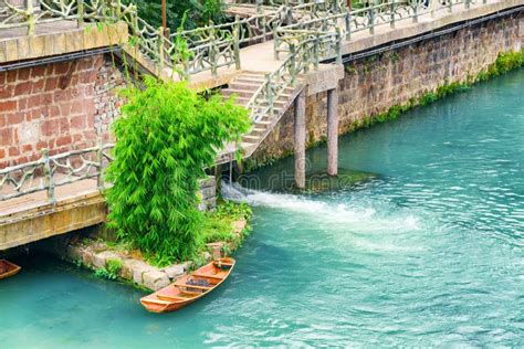 Wooden Boat On The Tuojiang River In Phoenix Ancient Town Stock Image