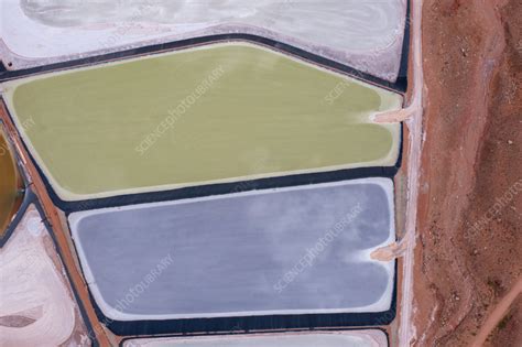 Aerial view of evaporation ponds at potash mine - Stock Image - C059/2171 - Science Photo Library