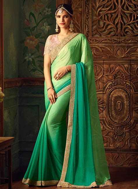 Light Pink And Green Embroidered Silk Saree Features A Beautiful Silk Saree Embroidery Work Is