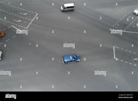 Aerial view on busy traffic intersection Stock Photo - Alamy