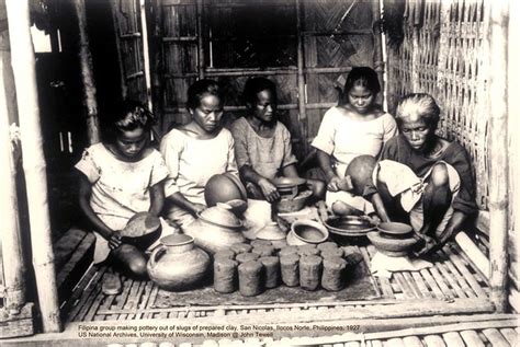 Filipina Group Making Pottery Out Of Slugs Of Prepared Clay San