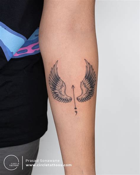 Wings Tattoo Designs On Arm