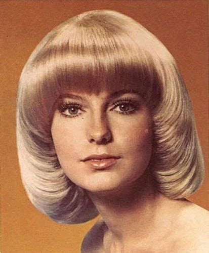 1970s Hairstyles For Long Hair 1970s Hairstyle With A Sleek Top And