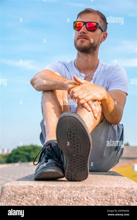 Sunny Portrait Of Thoughtful Handsome Man Admiring Something