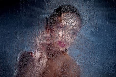 Beautiful Woman Behind Glass With Water Drops Stock Image Image Of