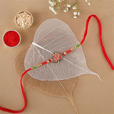 Sneh Exclusive Om Leaf Rakhi Usa Gift Sneh Exclusive Om Leaf Rakhi Fnp