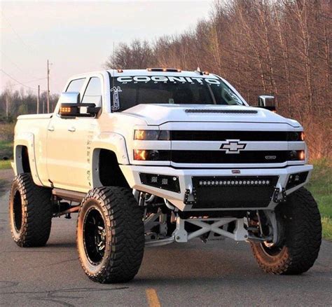 Jacked Up Trucks In Mud