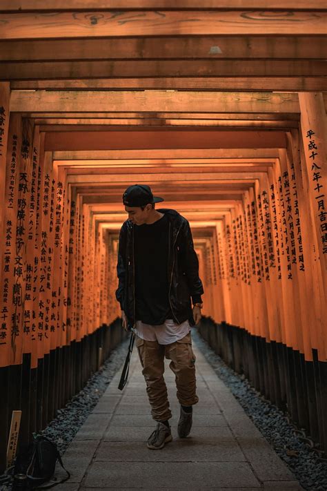 Hd Wallpaper Man Standing Between Torii Gate Man Walking Between