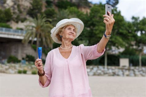 Mature Woman Taking Selfie On Beach Stock Image Image Of Emotions