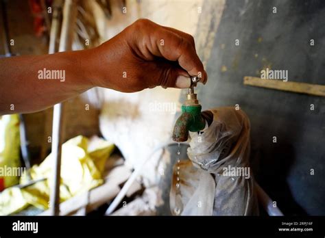 191122 Yicheng County Nov 22 2019 A Villager Checks Water