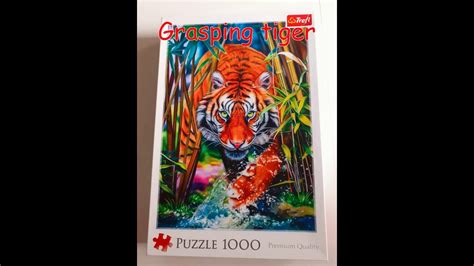 Puzzle Grasping Tiger Trefl Youtube