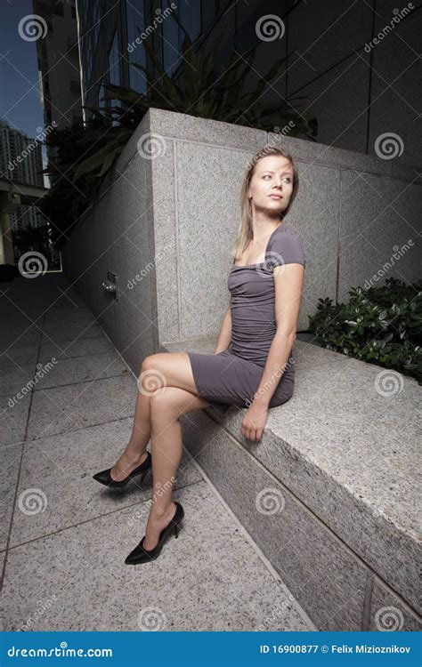 Woman Sitting With Legs Crossed Stock Image Image Of Attractive