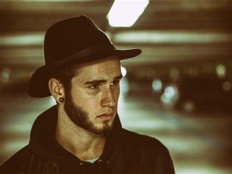 Premium Photo Close Up Portrait Of Man Wearing Hat