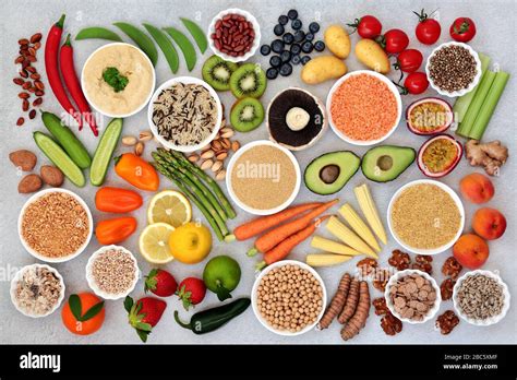 Plant based healthy diet vegan food with grains, nuts, seeds, fruit ...