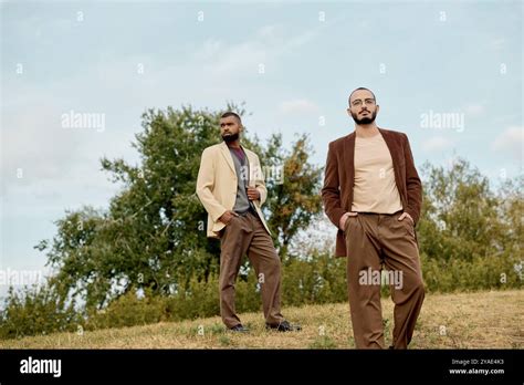 Handsome Men Showcase Trendy Autumn Attire While Posing Amidst Natures