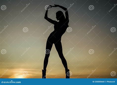 Silhouette Of Sensual Woman Dancing In Dusk Freedom Stock Photo